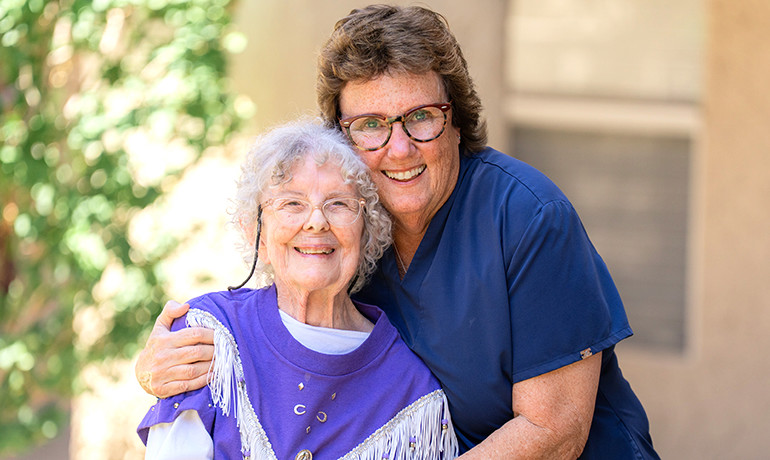 RN Kathleen Lewis with Patient