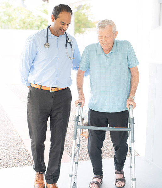 Dr. Gobi with patient Roger